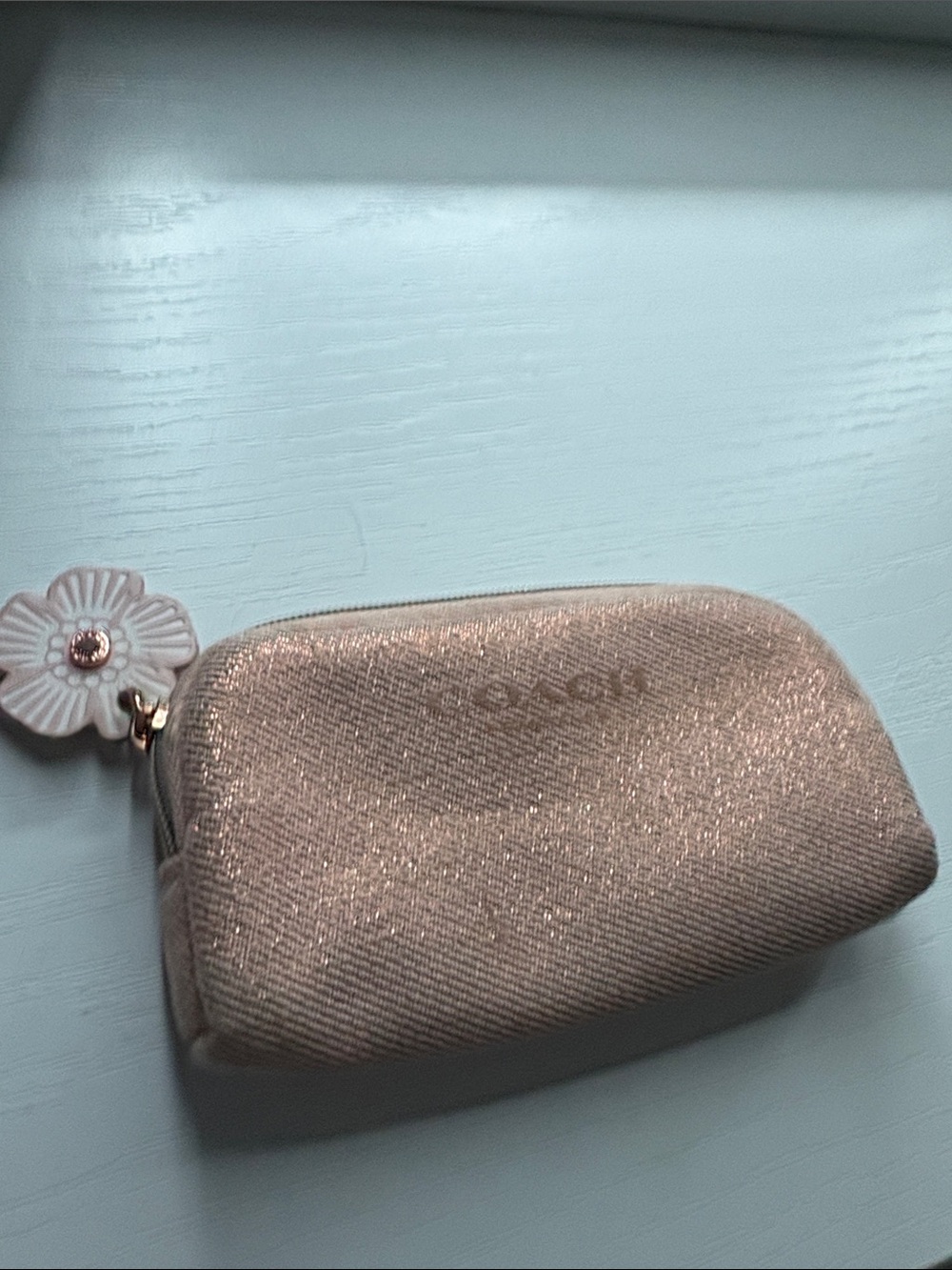 Coach Metallic Rose Gold Cosmetic Pouch with Flower Zip Charm